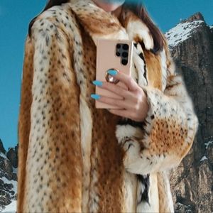 Pamela McCoy full length Faux Fur Lynx Coat. Size L.. pre owned.. beautiful